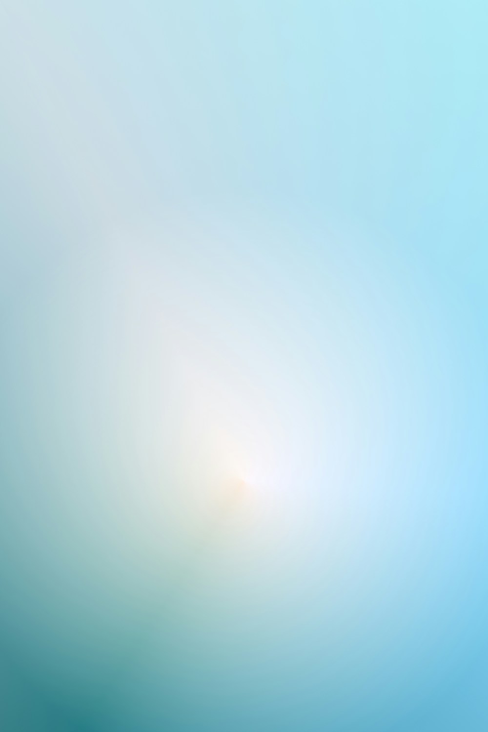 A soft blue sky glowing with sunlight